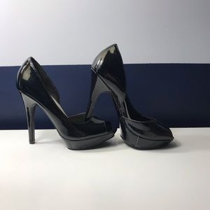 Black cut out pumps
